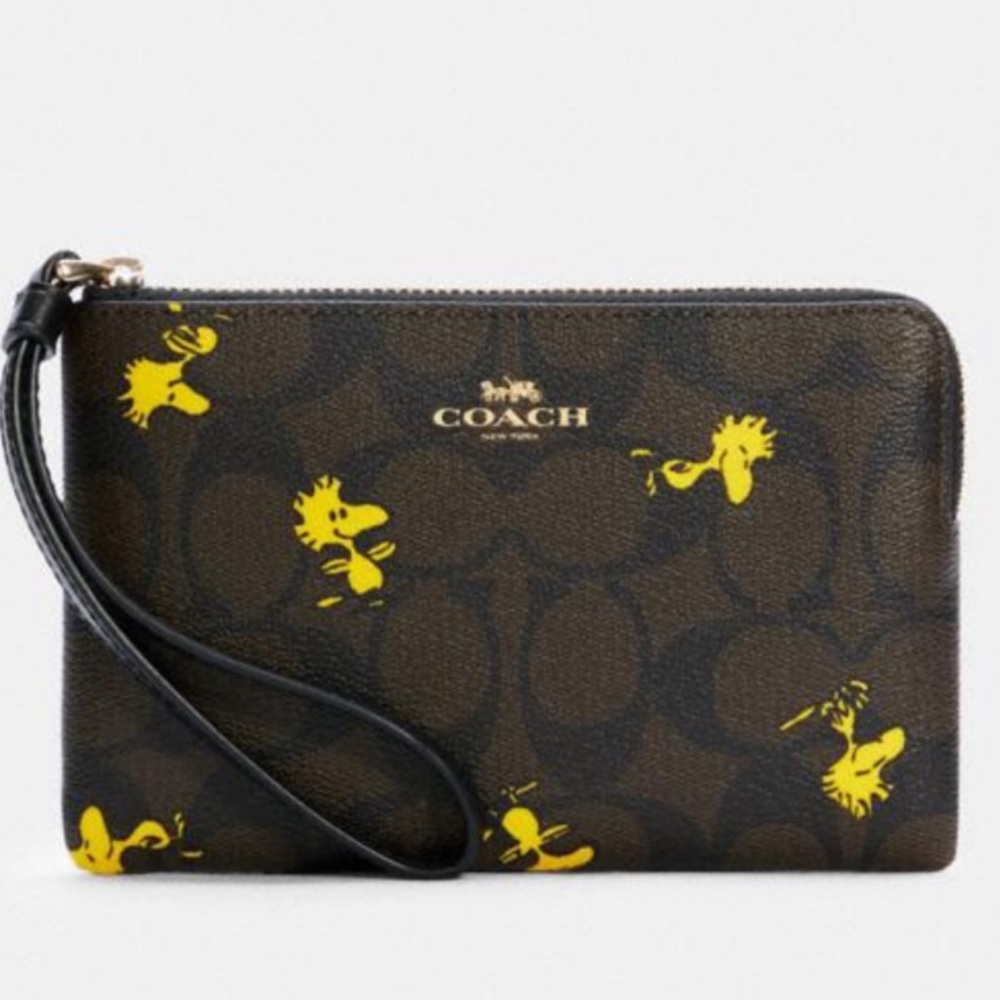 Special Limited Edition Coach X Peanuts Corner Zip Woodstock Wristlet.